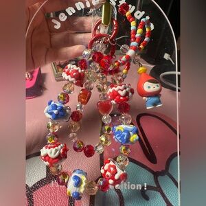 Colorful Beaded Keychain with featuring PUCKY.